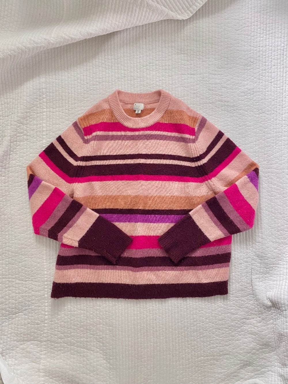 pink and maroon striped sweater